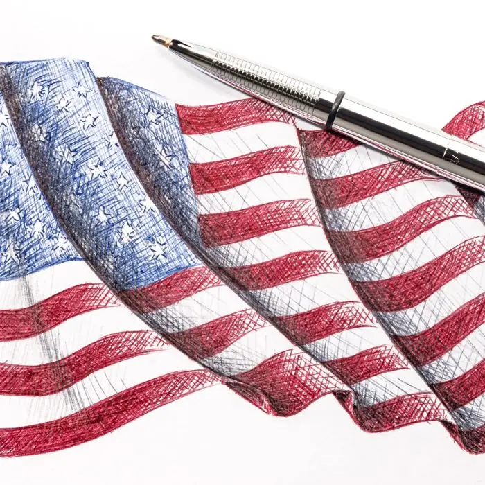 A pen resting on a waving American flag illustration.